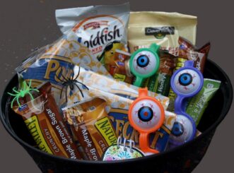 “Healthy Halloween treats arranged in festive bowls”