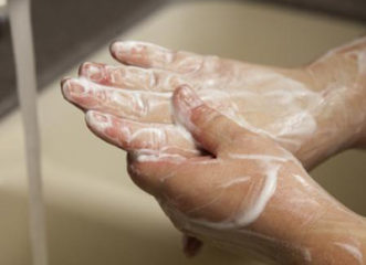 Wash hands thoroughly before and after touching food and food contact surfaces, and after touching packaging. Donna Bowen, ©2018, Clemson Extension