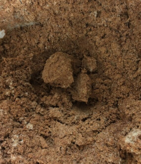 Sand that is worked into clay provides a surface for these clay particles to adhere to. The result is a concrete-like mixture that is more difficult to work than just clay alone.