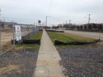 A properly installed construction entrance keeps the road clear of debris and sediment. Photo by Chuck Jarman, Clemson Extension.