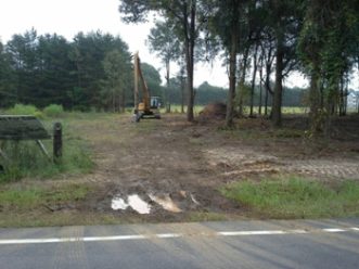 No stabilized entrance. Sediment is tracked onto the roadway and rutting has occurred. Photo by Dan Geddings, Sumter County Stormwater.