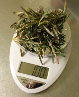 Properly weigh herb and garlic proportions using a scale.