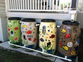 Figure 1. Area elementary school students painted these colorful rain barrels located at the College of Charleston Grice Marine Laboratory. The four rain barrels are "daisy chained"