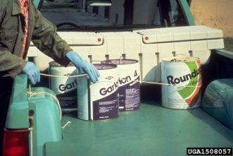 Pesticide containers in the back of a pick up truck. ©USDA Forest Service - Region 8 - Southern , USDA Forest Service, Bugwood.org