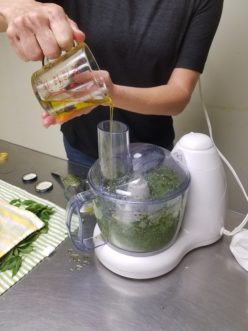 Olive oil is then added to the course chopped mixture.<br />LayLa Burgess, ©2018, HGIC, Clemson University