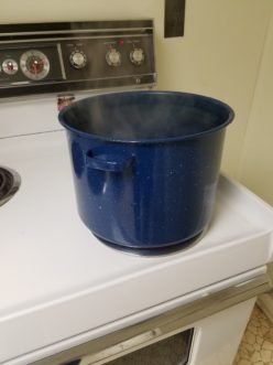 Deep pots are ideal for heating base vinegars to just below the boiling point. Allow pot to cool before handling.