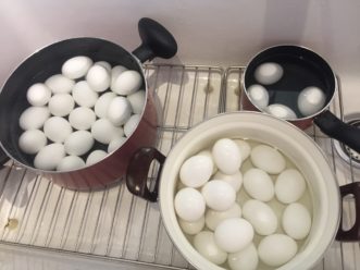 Hard cook eggs to make them safe for dyeing and hunting.