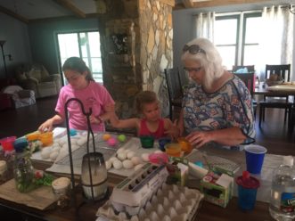 Dye eggs with food grade coloring and decorations if they will be eaten.