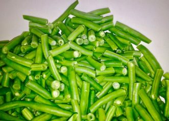 Green beans before blanching. Blanching vegetables before freezing, helps them to retain their color.