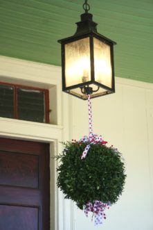 Kissing balls are traditionally hung from doorways during the holidays to bestow goodwill