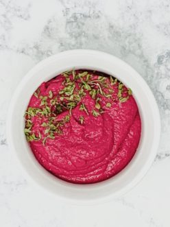Freshly prepared roasted beet hummus.