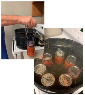 Loading the canner using a jar lifter.
