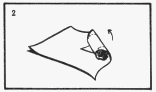 Paper wrapped tightly around the meat and then rolled toward the opposite corner stopping about 3 to 5 inches from the corner