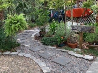 “This gravel pathway incorporates stepping stones to provide a more permeable walkway than a traditional concrete sidewalk.”