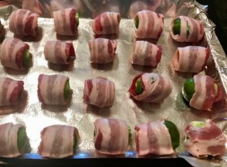 Place bacon-wrapped Brussels sprouts on a baking sheet with the seam side down. Adair Hoover, HGIC 2020, Clemson Extension