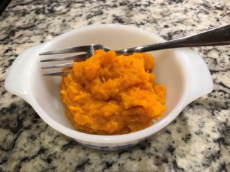 Scoop out cooked squash into a bowl, mash with a fork, add salt, sugar, and butter to taste. Adair Hoover, ©2020, HGIC, Clemson Extension