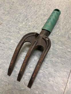 Some tools, like this garden fork, have grooves that hold soil. Stephanie Turner, ©2021, Clemson Extension