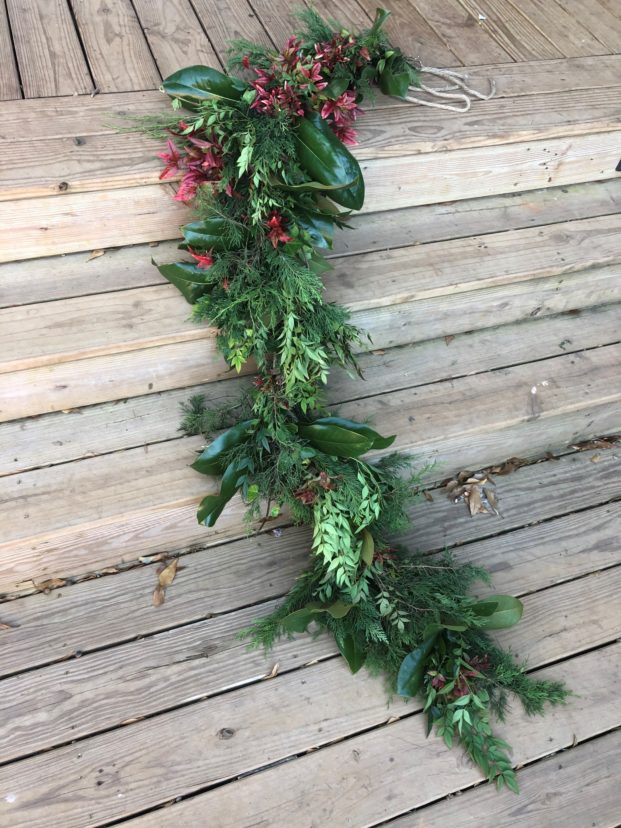 Live greenery garland tied together with twine.