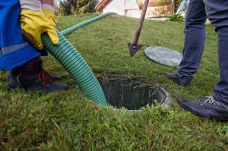Figure 1. Septic system being pumped out.