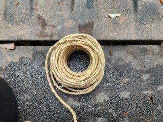 Floral wire covered with raffia adds another texture to the design.