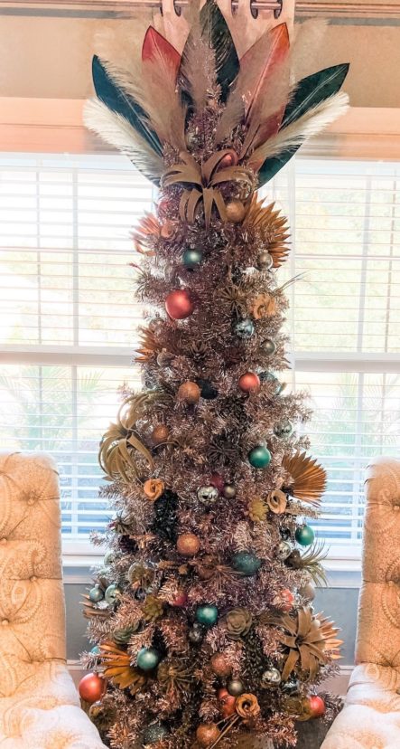 Decorate a one-of-a-kind Christmas tree with air plants, palm fronds, and palm rosettes.