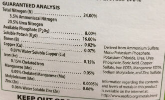 The label on this 24-8-16 fertilizer indicates the percentages of nitrogen (N), phosphate (P2O5), and potash (K2O) in the bag. Since none of the nitrogen is water-insoluble, this is a fast-release nitrogen fertilizer. This fertilizer also contains micronutrients.