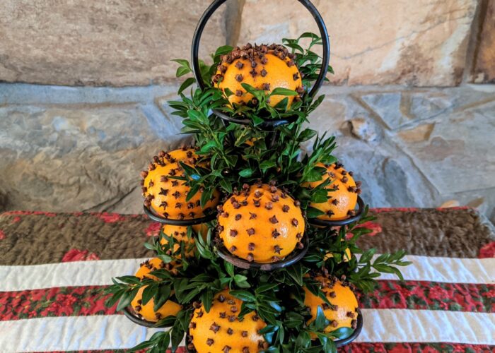 Orange pomander balls will fill a home with a festive, s
