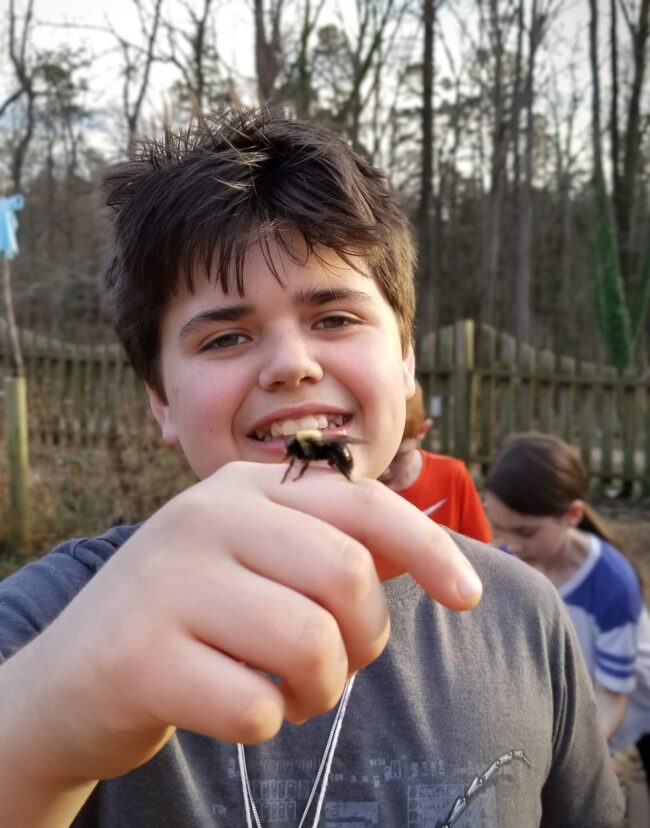 Gardening for bees is an excellent way to get children involved in learning about them.