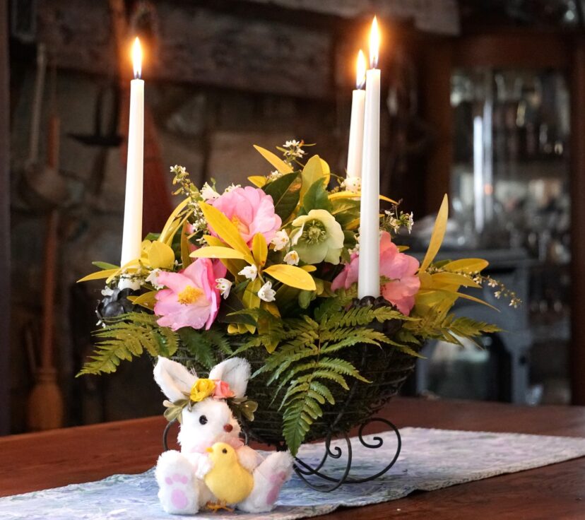 My dinner table is decorated with a springtime arrangement of Taylor’s Perfection Camellias (Camellia x ‘Taylor’s Perfection’), Florida Sunshine Anise (Illicium parviflorum 'Florida Sunshine'), Lenten Roses (Helleborus orientalis), Ogon Spirea (Spiraea thunbergii ‘Ogon’), Snowflakes (Leucojum aestivum), and Autumn Ferns (Dryopteris erythrosora).