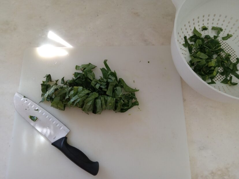 Roll leaves and then slice, known as chiffonade.