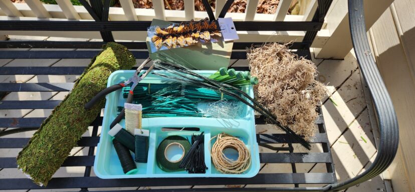 Wire, tape, floral tubes, picks, and moss are useful tools for making floral arrangements.