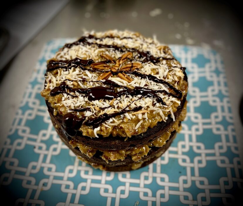 A cake with ganache frosting.
