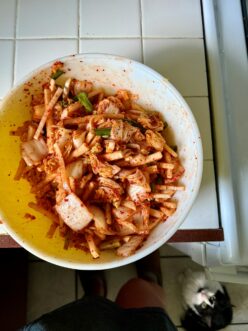 A bowl of food on a counter AI-generated content may be incorrect.