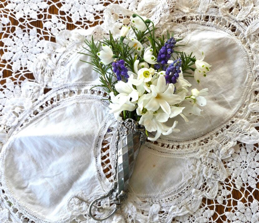 Antique tussie-mussie bouquet holder with decorative handle and chain